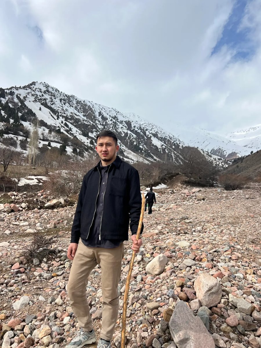 Ziyodullo hiking in the mountains